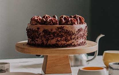 brown cake on wooden tray